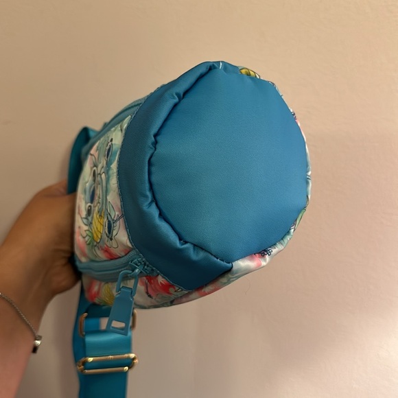 Crossbody water bottle bag. Has a pocket for card, money and many more. NWT - Picture 4 of 5